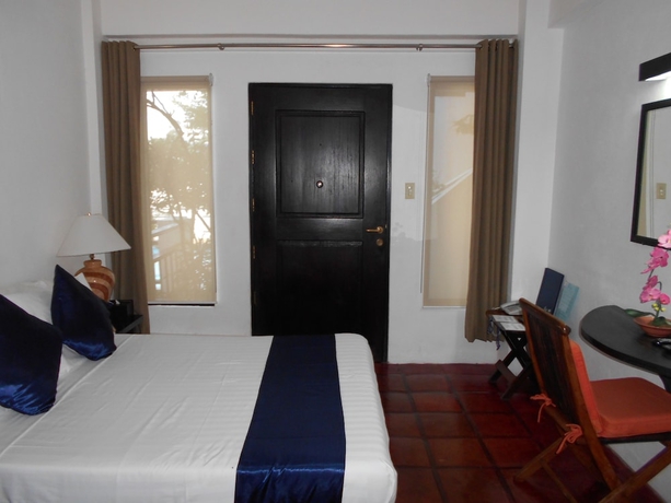 Imagen de la habitación del Hotel Out of the Blue Resort. Foto 11