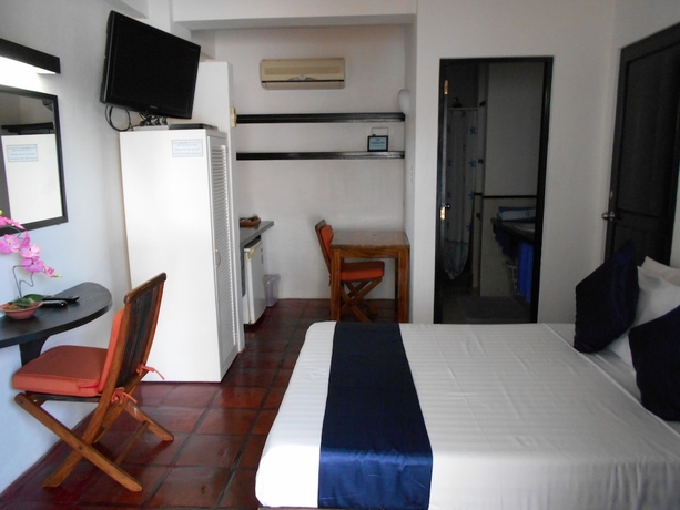 Imagen de la habitación del Hotel Out of the Blue Resort. Foto 12