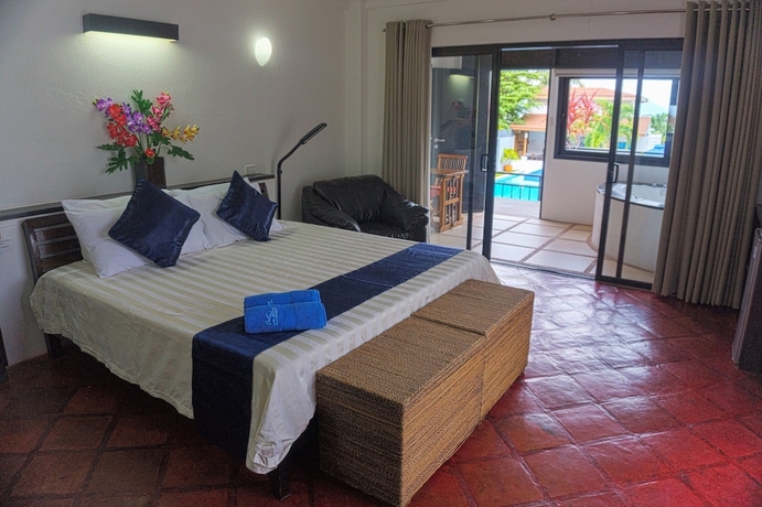 Imagen de la habitación del Hotel Out of the Blue Resort. Foto 13