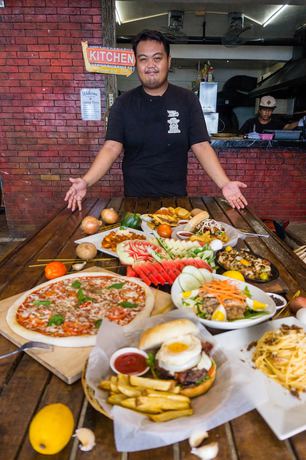 Imagen del bar/restaurante del Hotel Outpost Beach Hostel - Adults Only. Foto 9