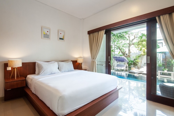 Imagen de la habitación del Hotel Outpost Canggu. Foto 6