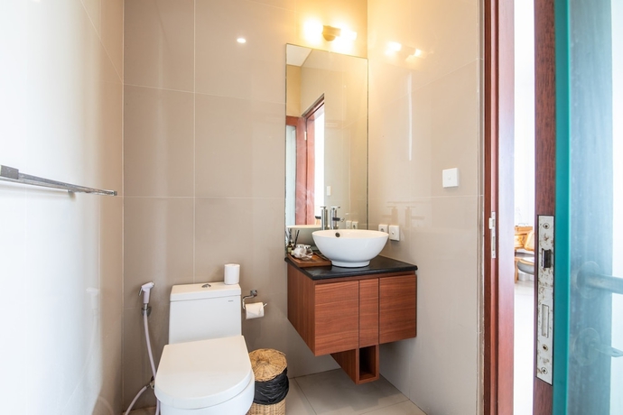 Imagen de la habitación del Hotel Outpost Canggu. Foto 18