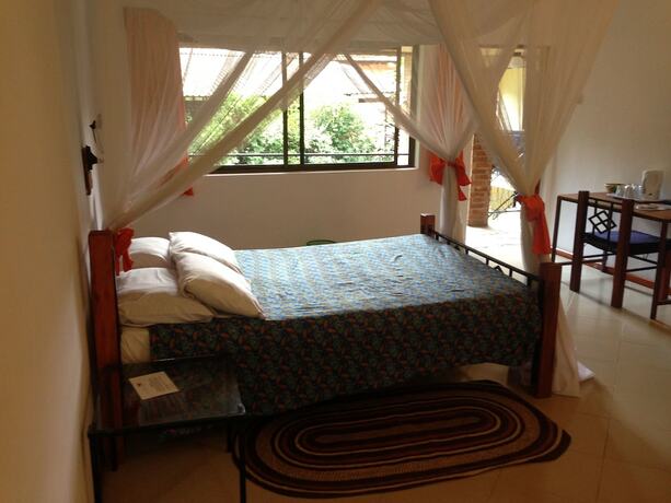 Imagen de la habitación del Hotel Outpost Lodge. Foto 17