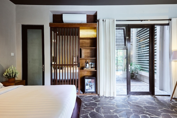 Imagen de la habitación del Hotel Outpost Penestanan. Foto 12