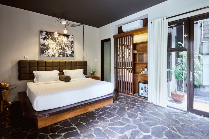 Imagen de la habitación del Hotel Outpost Penestanan. Foto 13