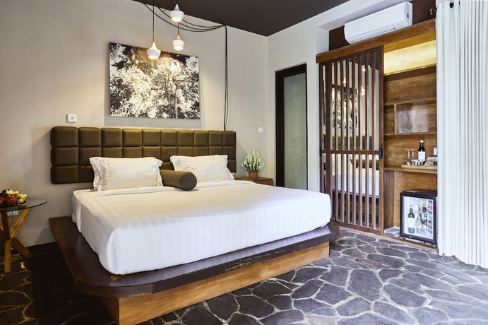 Imagen de la habitación del Hotel Outpost Penestanan. Foto 14