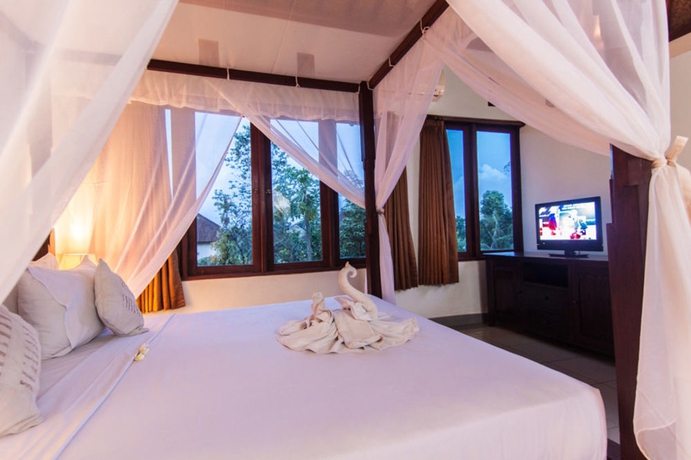 Imagen de la habitación del Hotel Outpost Ubud Coliving Suites, Ubud. Foto 6