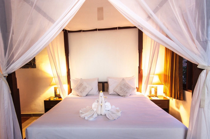 Imagen de la habitación del Hotel Outpost Ubud Coliving Suites, Ubud. Foto 7