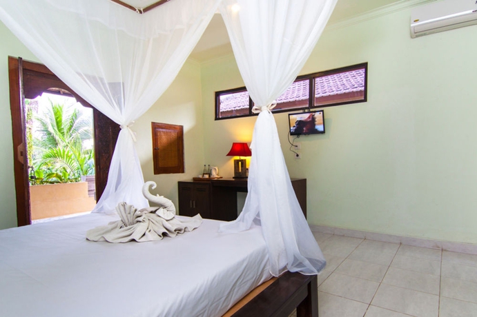 Imagen de la habitación del Hotel Outpost Ubud Coliving Suites, Ubud. Foto 12