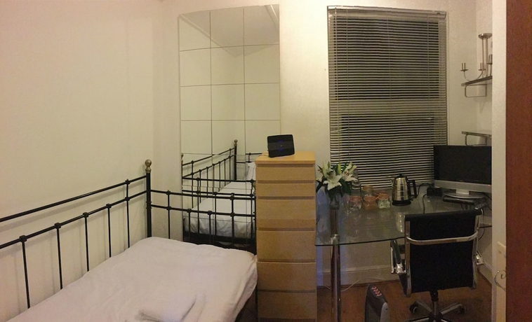 Imagen de la habitación del Hotel Outram 26. Foto 12