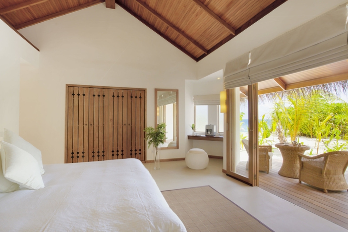 Imagen de la habitación del Hotel Outrigger Maldives Maafushivaru Resort. Foto 8