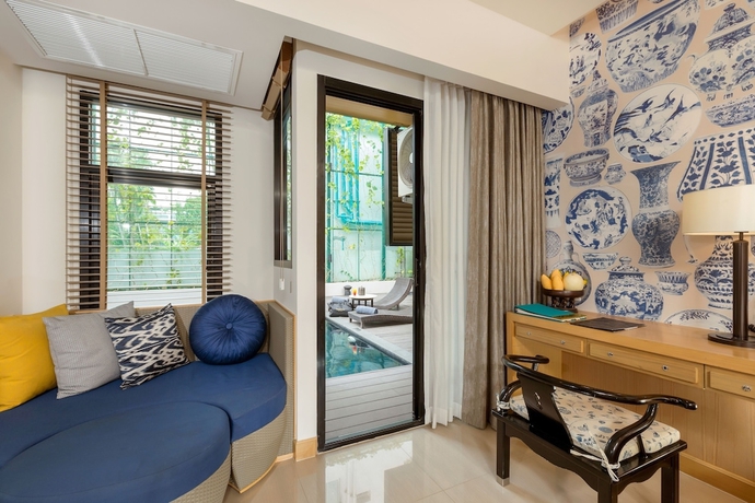 Imagen de la habitación del Hotel Outrigger Surin Beach Resort. Foto 5