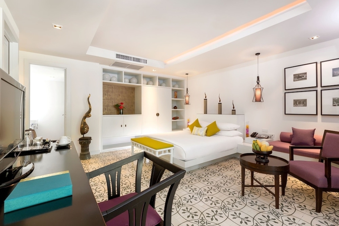 Imagen de la habitación del Hotel Outrigger Surin Beach Resort. Foto 7