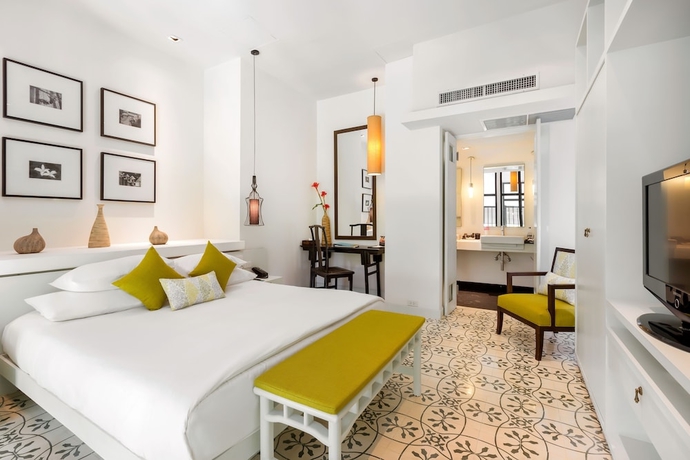 Imagen de la habitación del Hotel Outrigger Surin Beach Resort. Foto 13