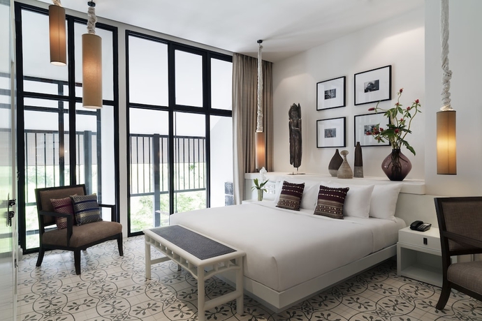 Imagen de la habitación del Hotel Outrigger Surin Beach Resort. Foto 14