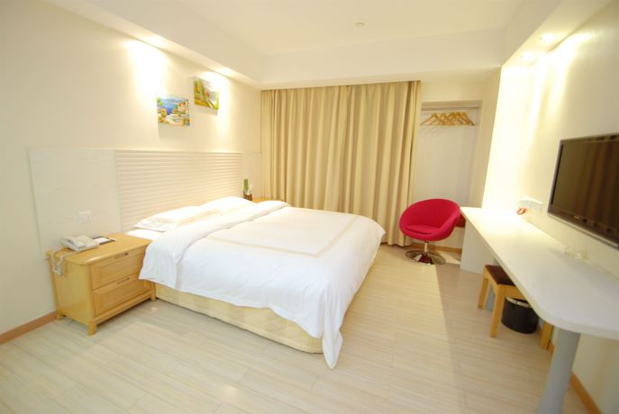 Imagen de la habitación del Hotel Overseas Chinese Friendship. Foto 2