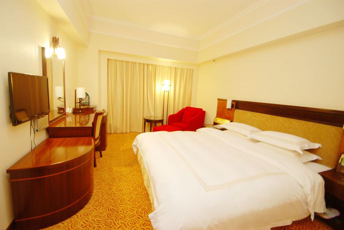 Imagen de la habitación del Hotel Overseas Chinese Friendship. Foto 4