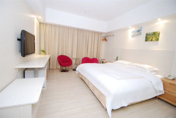 Imagen de la habitación del Hotel Overseas Chinese Friendship. Foto 10