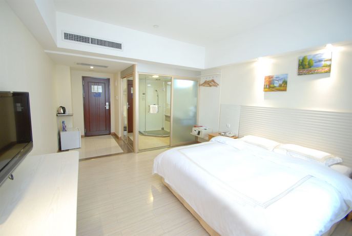 Imagen de la habitación del Hotel Overseas Chinese Friendship. Foto 11