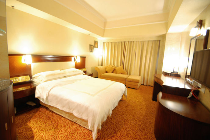 Imagen de la habitación del Hotel Overseas Chinese Friendship. Foto 12