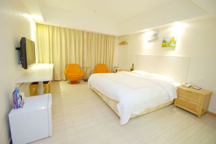 Imagen de la habitación del Hotel Overseas Chinese Friendship. Foto 13