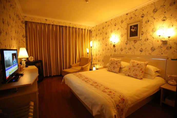 Imagen de la habitación del Hotel Overseas Chinese International. Foto 4