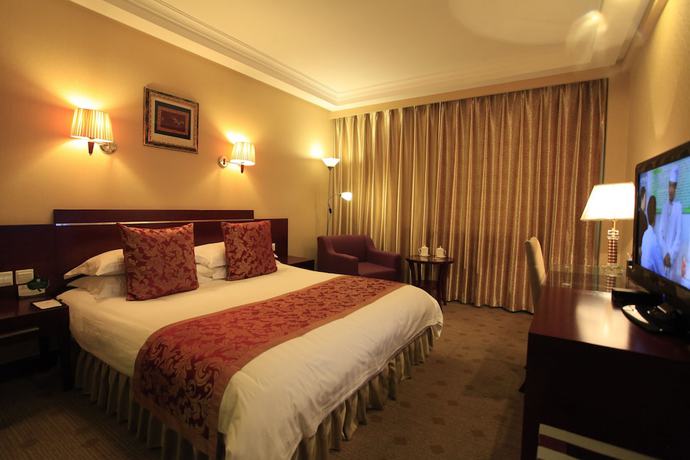 Imagen de la habitación del Hotel Overseas Chinese International. Foto 5