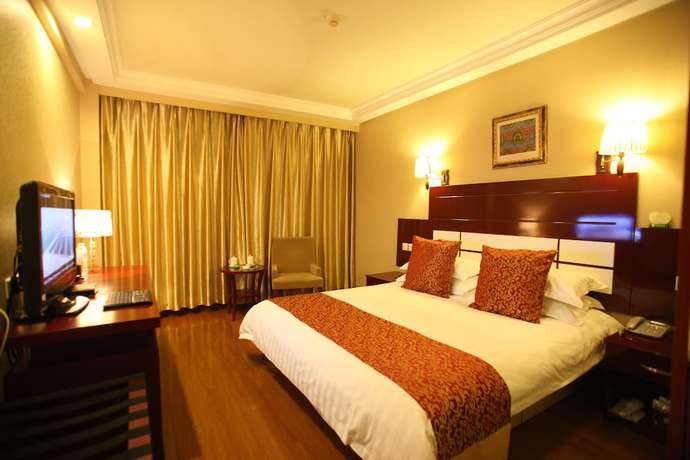 Imagen de la habitación del Hotel Overseas Chinese International. Foto 7