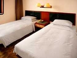 Imagen de la habitación del Hotel Overseas Chinese, Shangcheng District. Foto 8