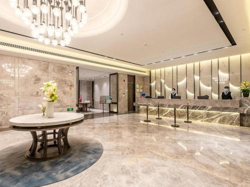 Imagen general del Hotel Overseas Chinese, Xiangzhou District. Foto 3