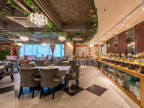 Imagen general del Hotel Overseas Chinese, Xiangzhou District. Foto 4