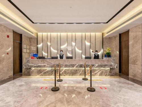 Imagen general del Hotel Overseas Chinese, Xiangzhou District. Foto 7