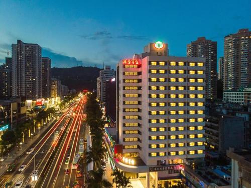 Imagen general del Hotel Overseas Chinese, Xiangzhou District. Foto 10