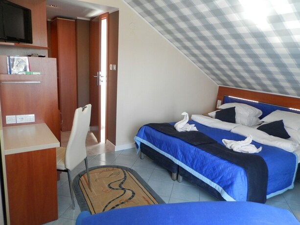 Imagen de la habitación del Hotel Ow Sargus. Foto 18