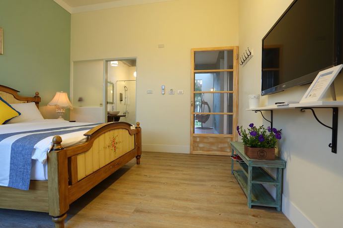 Imagen de la habitación del Hotel OwlStay GreenVilla. Foto 2