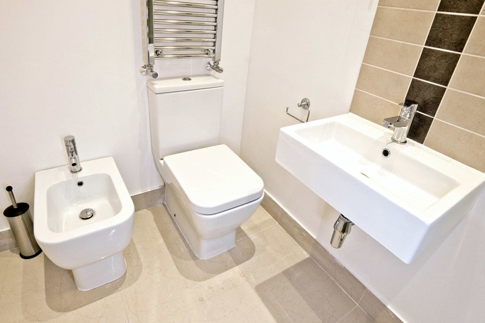 Imagen de la habitación del Hotel Oxbridge Apartments. Foto 2