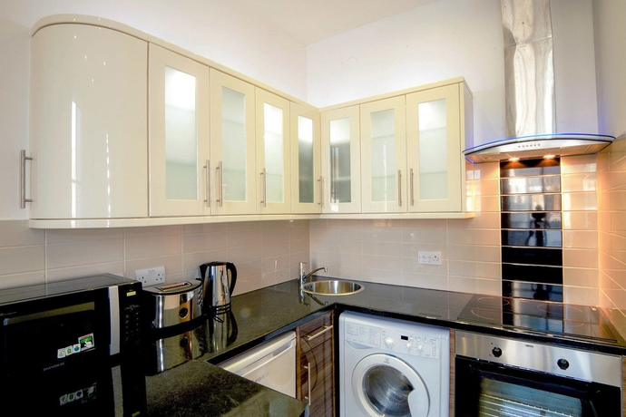 Imagen de la habitación del Hotel Oxbridge Apartments. Foto 9