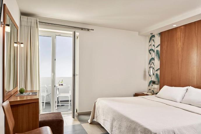 Imagen de la habitación del Hotel Oxygen Favie. Foto 4