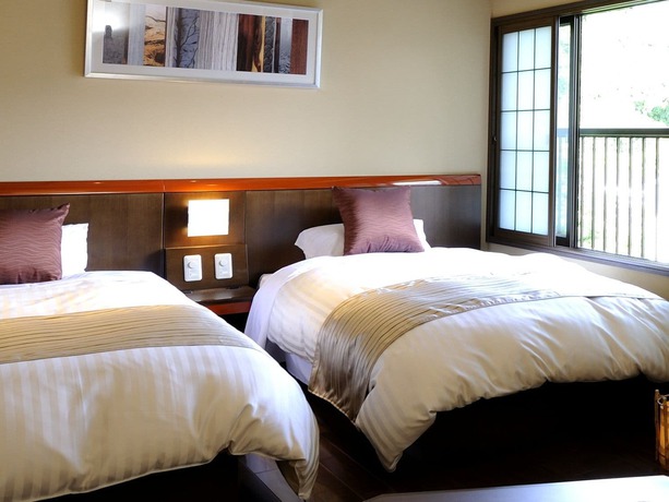 Imagen de la habitación del Hotel Oyado Ikegami. Foto 18