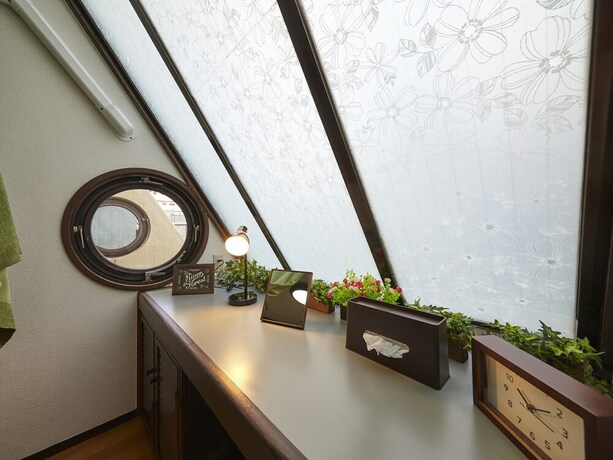 Imagen de la habitación del Hotel Oyado Kinokuniya Gotou Machi. Foto 20