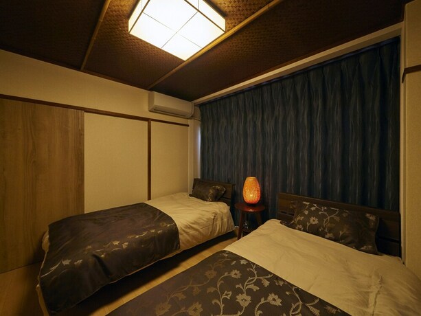 Imagen de la habitación del Hotel Oyado Kinokuniya Gotou Machi. Foto 22
