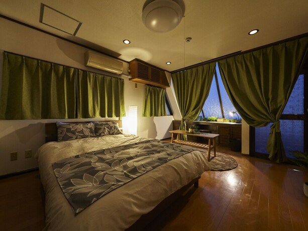 Imagen de la habitación del Hotel Oyado Kinokuniya Gotou Machi. Foto 23