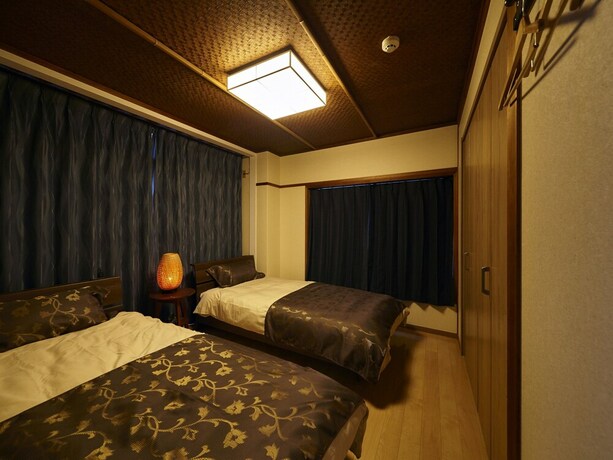 Imagen de la habitación del Hotel Oyado Kinokuniya Gotou Machi. Foto 31
