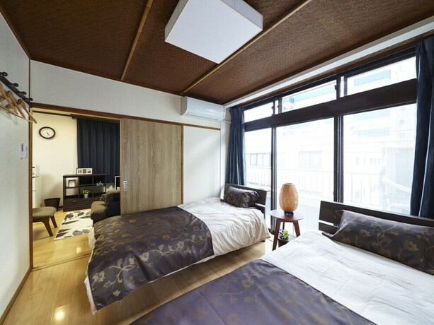 Imagen de la habitación del Hotel Oyado Kinokuniya Gotou Machi. Foto 34