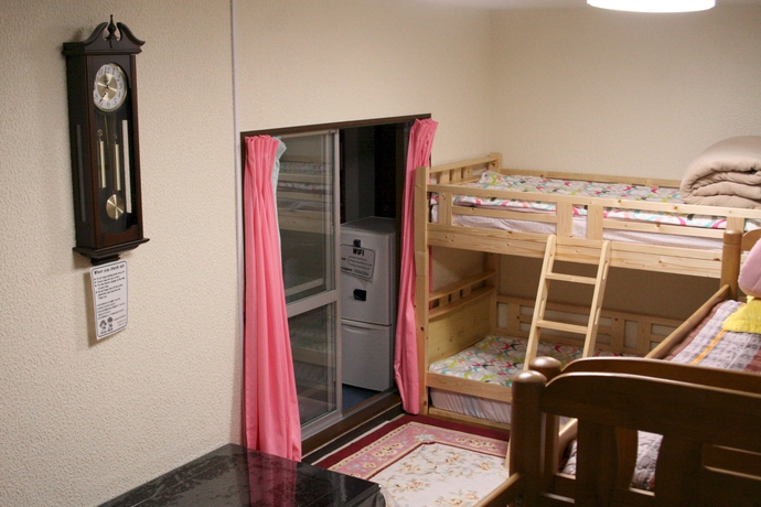 Imagen de la habitación del Hotel Oyama Guest House Kyoto. Foto 11