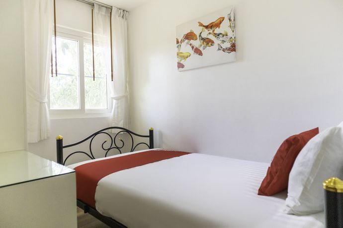 Imagen de la habitación del Hotel Oyo 1005 Pacotte Boutique Resort. Foto 12