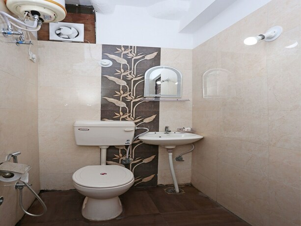Imagen de la habitación del Hotel Oyo 10137 Vaishnavi. Foto 11