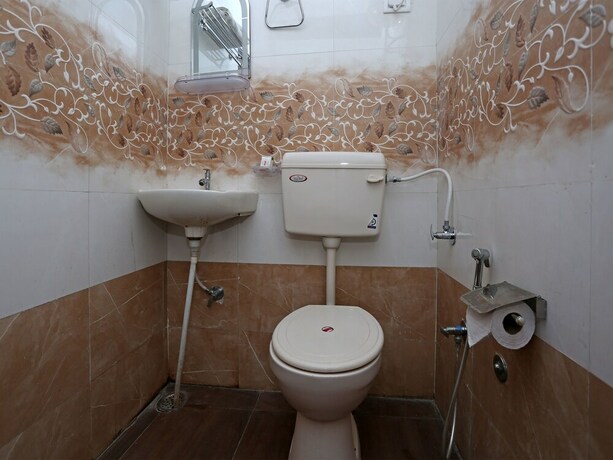 Imagen de la habitación del Hotel Oyo 10137 Vaishnavi. Foto 15