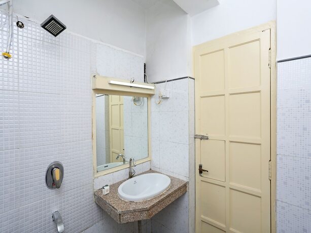Imagen de la habitación del Hotel Oyo 10264 Midtown. Foto 6
