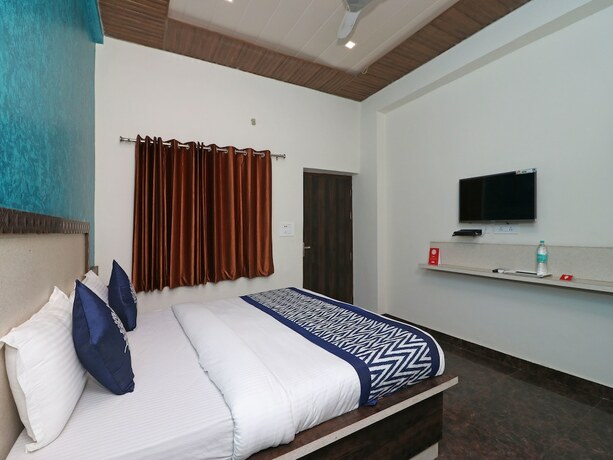Imagen de la habitación del Hotel Oyo 10290 Yashogopal Resortico. Foto 19